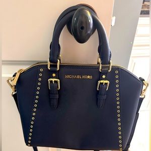 Michael Kors handbag. Short and long adjustable strap. Only carried a few times!